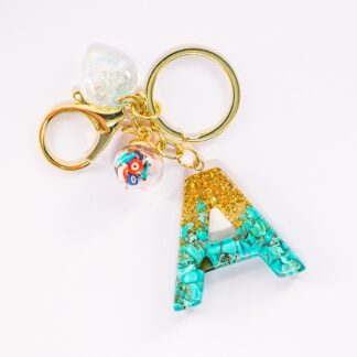 STORELUXY Blue Stone and Glittery Gold Evil Eye Initial Keychain With Good Luck Amulet Protection Charm and Heart Pendant Suspended in High Quality Resin Personalised In Letter A